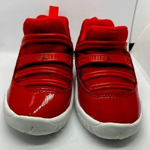 Baby Red Nike shoes 0-6 months.